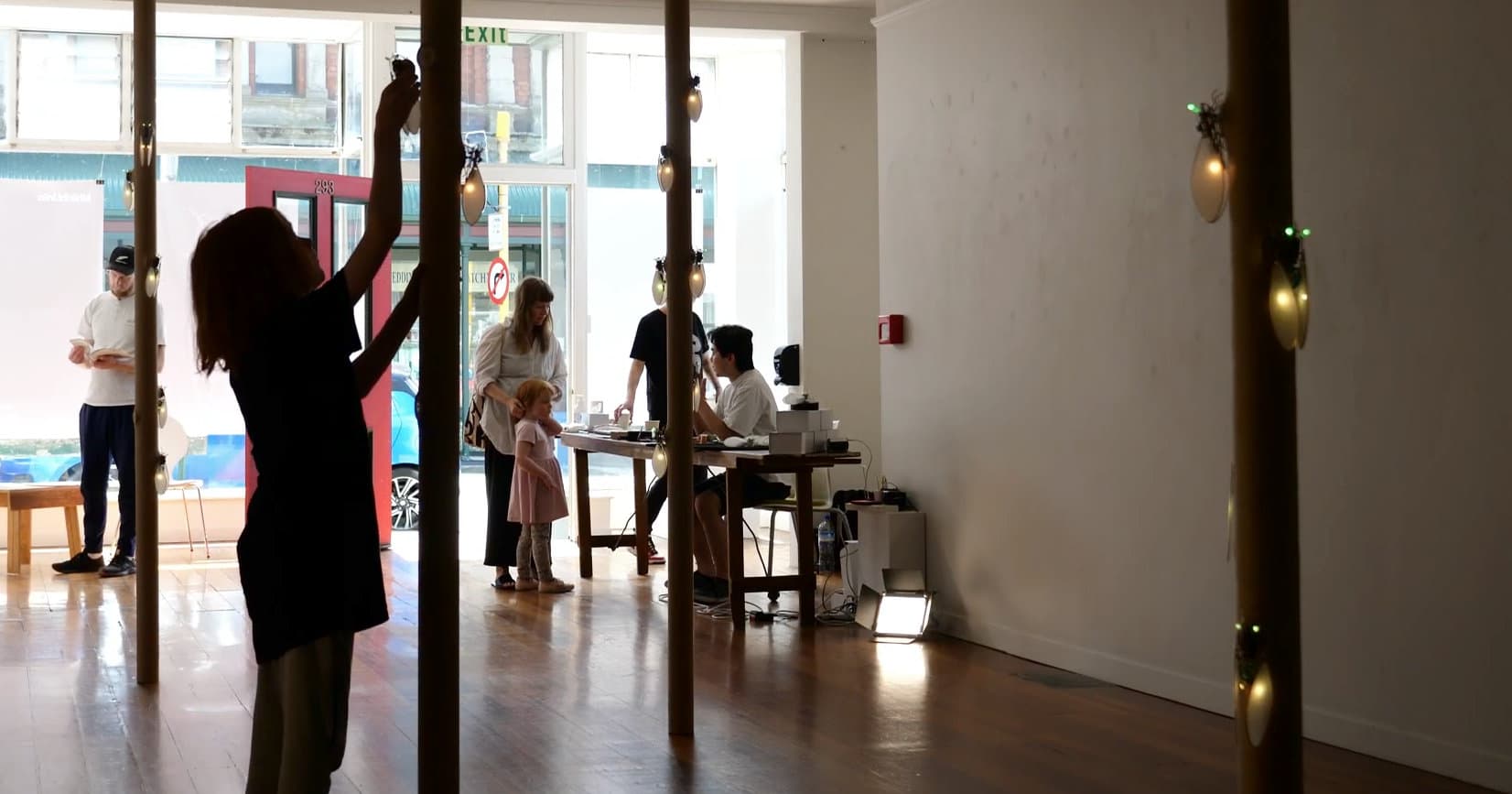 Visitors interacting with the KIHIKIHI installation